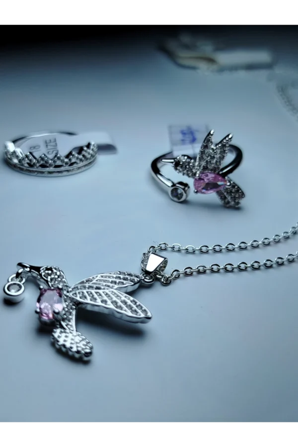 Anillo colibrí regulable + Collar colibrí rosa.